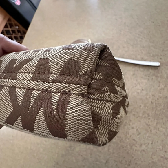 Michael Kors Monogram Drawstring Bucket Brown Mini WithTassel Crossbody Bag - Picture 7 of 14